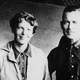 Earhart with navigator Fred Noonan on June 11, 1937. ( Topical Press Agency/Getty Images)